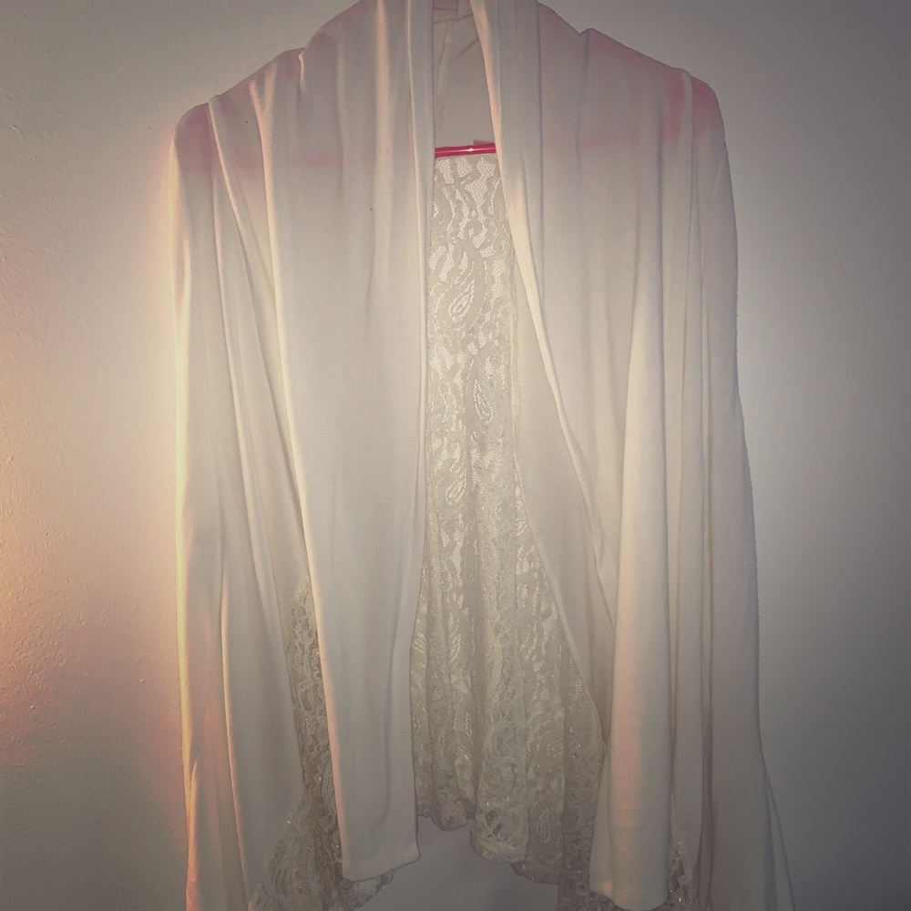 Sleeveless white lace cardigan